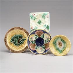Three Victorian MAJOLICA dishes and a saucer, probably English, circa 1870-1880, the dishes with …