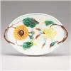 Image 1 : WARDLE AND COMPANY MAJOLICA bread dish, circa 1875, decorated with a sunflower and lily. Restorat…