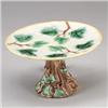 Image 1 : ETRUSCAN MAJOLICA center, circa 1875, in maple leaf pattern, with rustic stem. Impressed monogram…