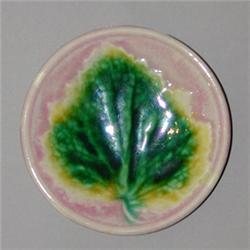 ETRUSCAN MAJOLICA butter pat, circa 1875, in leaf patterning of green and yellow. on pink ground.…