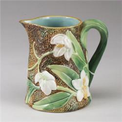 GEORGE JONES MAJOLICA pond lily jug, circa 1870, with naturalistically colored lilies on rustic g…