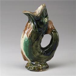 ENGLISH MAJOLICA gurgling fish jug, circa 1890, glazed in naturalistic colors. 11 1/4" height…