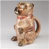 Image 1 : ENGLISH MAJOLICA pug dog jug, circa 1880, modeled as a seated pug in shades of brown, pink interi…