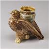 Image 1 : ENGLISH MAJOLICA figural vase, circa 1875, modeled as a martin holding an amphora, perched on a b…
