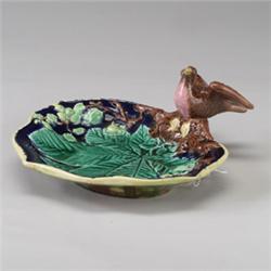 ENGLISH MAJOLICA serving dish, circa 1875, patterned with leaf, blossom and branches, applied wit…