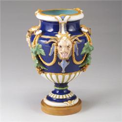 Early MINTON MAJOLICA vase, circa 1855, molded with four mask handles and leafage joined by rope …