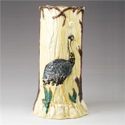 ENGLISH MAJOLICA umbrella stand, circa 1880, modeled as a rustic tree stump, decorated with a sto…