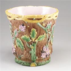 Monumental ENGLISH MAJOLICA jardiniere, circa 1865, molded as a rustic hollow tree trunk applied …