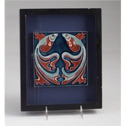 Two fine VILLEROY & BOCH tiles molded with two fish in blue and red with yellow eye, on a blue gr…