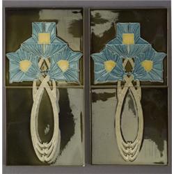 Two pairs of German tiles with stylized triple blue and yellow blossoms on looping celadon stems,…