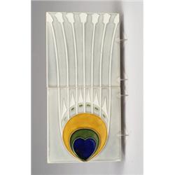 Fine and unusual German two-tile frieze with a stylized peacock feather in blue, green, amber and…