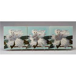 Three fine GILLIOT & Cie (Hemixem, Belgium) frieze tiles with a white and gray hibiscus with gree…