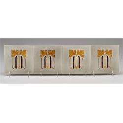 Four ERNST TEICHERT (Germany) tiles with stylized gingko leaves in brown and amber cuenca, agains…