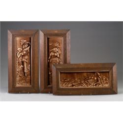 Set of three American tiles, probably from a fireplace surround, each molded with a nude, the ver…