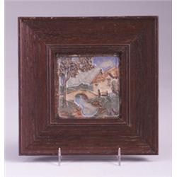 CLAYCRAFT tile molded with thatched roof cottage and bridge, in polychrome. Mounted in period mol…