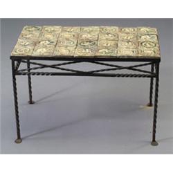 Rare wrought-iron table covered in MORAVIAN tiles depicting the seasons and animals, all covered …