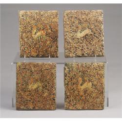 Four rare MORAVIAN Persian Antelope tiles, each with an antelope leaping through a floral backgro…