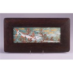 Fine and rare DE PORCELEYNE FLES tile, decorated in cuenca with fish swimming around algea, in po…