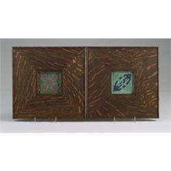 Two small Arts & Crafts tiles, one by GRUEBY with a dark brown burnished clay flower on a good cu…
