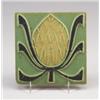 Image 1 : ROOKWOOD FAIENCE tile decorated in matte cuenca with a stylized fruit in yellow and black, on gre…