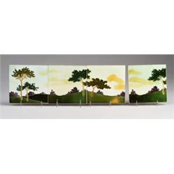 Four frieze tiles attributed to JOHANN VON SCHWARZ, with trees in a rolling landscape in green, a…