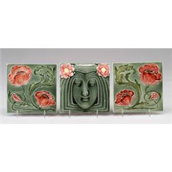 Fine three-tile frieze by ERNST TEICHERT (Germany) molded with a stylized woman's head with red a…