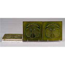 Four fine and rare ERNST TEICHERT (Germany) tiles embossed with gibbon faces under sheer green gl…