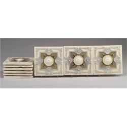 Nine GILLIOT & Cie. (Hemiksem, Belgium) tiles embossed with a coffered design with rope border, i…