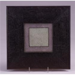 SATURDAY EVENING GIRLS trivet tile with an inner green square framed in gray, in semi-matte glaze…