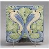 Image 1 : Fine ROOKWOOD trivet tile, 1921, embossed with a pair of stylized birds of paradise in amber and …