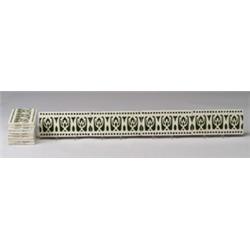 Twelve Belgian border frieze tiles stencil-decorated with a stylized floral design in dark green …