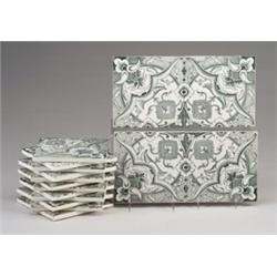 Sixteen BOCH FRERES tiles, transfer-printed with an Oriental floral pattern (4-tile repeat) in da…
