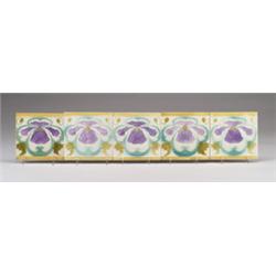 Five LE GLAIVE (Belgium) frieze tiles, decorated in cuenca with purple poppies with amber leaves …