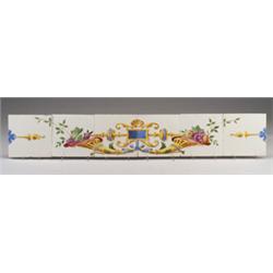 Six-tile frieze china-painted on French blanks with a Renaissance design of golden cornucopias fi…