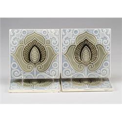 Four GILLIOT & Cie (Hemixem, Belgium) tiles embossed with stylized green flowers on blue-gray cur…