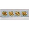 Image 1 : Twelve small European tiles, each embossed with two yellow and brown pansies on blue ground. A co…