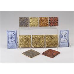 Eleven contemporary tiles: nine assorted 3" sq. and 4" sq. tiles in the Arts & Crafts style, with…
