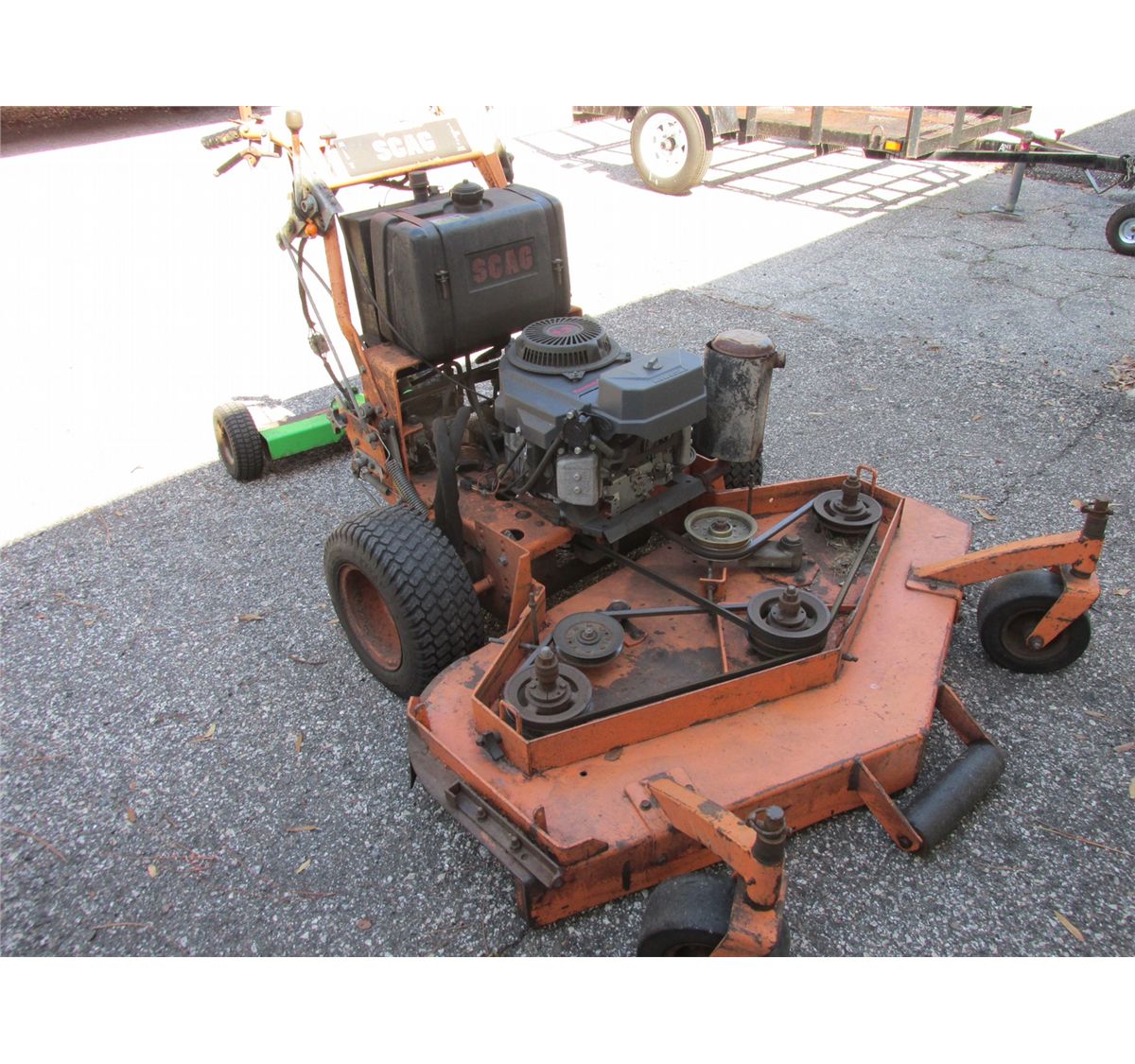 Scag walkbehind mower, sulky, 2 yr. old Kawasaki engine, 52" deck