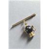 Image 1 : DEUTSCHLAND Brosche mit Anhänger Gold 14 K Holz. Nadel mit anhängendem stilisiertem Kopf einer...