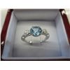 Image 1 : Blue topaz one carat ring set with 8 diamonds