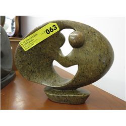 Carved soapstone statue 9" tall, 11" wide