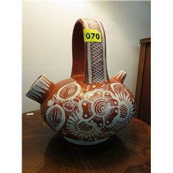 Pottery jug, signed "Pablo Simom"