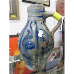 Glazed pottery jug, hand made