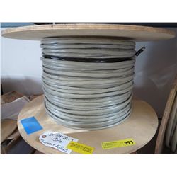 Spool of telecommunications wire