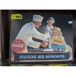 Cardboard Coca Cola advertising sign