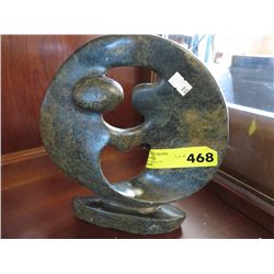 Carved stone statue 9" x 9"