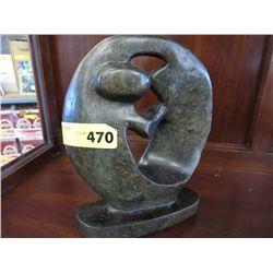 Carved stone statue 8" x 9"