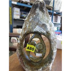 Carved stone statue 10" x 7"