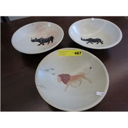 3 carved stone bowls