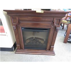 Electric fire place in surround